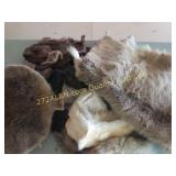 group of fur pieces on top of table