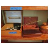 Cigar boxes and cigar cutters