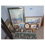 Large group of framed pictures