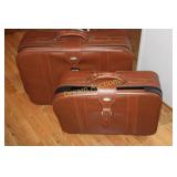 2 Vintage Suitcases, Large one has 4 Wheels
