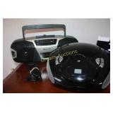 2 Radios, AM/FM/CD one Cord
