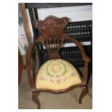 Antique Arm Chair with Ornate Carvings