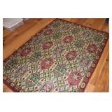 Area Rug 75x55, appears wool?