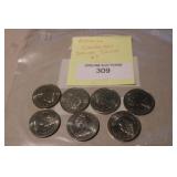 7 Assorted Canadian Dollar Coins