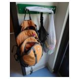Diaper Bags Hanging in Corner