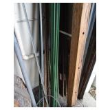 Lot of (7) 10ft Rebar & Related items in corner
