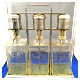 Decanter dispensers in chrome carrier