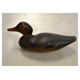 Carved wood duck decoys