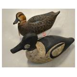 Carved wood duck decoys