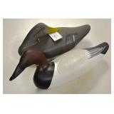 Carved wood duck decoys