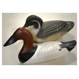 Carved wood duck decoys