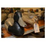 Carved wood duck decoys