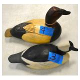 Carved wood duck decoys