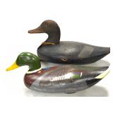 Carved wood duck decoys