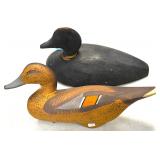 Carved wood duck decoys