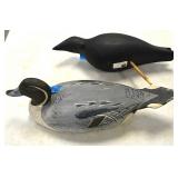 Carved wood duck decoys