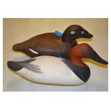 Carved wood duck decoys