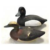 Carved wood duck decoys