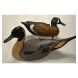 Carved wood duck decoys
