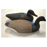 Carved wood duck decoys