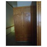 Solid oak 2 door cabinet. Measurements are about