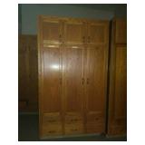 Solid oak 3 door cabinet. First come first pick.