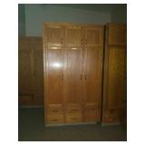 Solid oak 3 door cabinet. First come first pick.