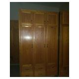 Solid oak 3 door cabinet. First come first pick.
