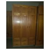 Solid oak 3 door cabinet. First come first pick.