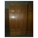 Solid oak 3 door cabinet. First come first pick.