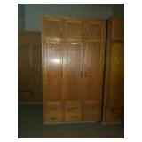 Solid oak 3 door cabinet. First come first pick.