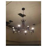 Large round hanging light. Does have globes