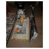 Schlueter systems tile saw with stand. Working