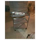 Stainless steel cart. White boxes not included