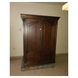 Large dark wood armoire with bonus tv. Approx