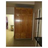 Solid oak cabinet. Measures about 53in wide and
