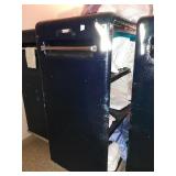 Rolling laundry cart on wheels.  Has 3