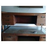 Large wood desk needs a little love.