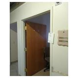 Steele door frame with wood door and hardware.