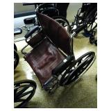 XL wheelchair. No front wheels.  
Tip: you can