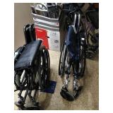 Group of 2 wheelchairs.