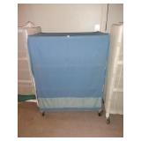 Covered laundry cart on wheels, with 3 shelves