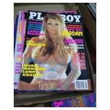 Stack of 10 Playboy magazines 2002