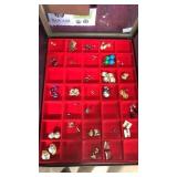 Display case of earrings. Case IS included