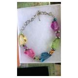 Costume jewelry in box. statement necklace