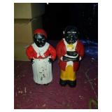 Pair of modern cast iron banks.  Measures about 5