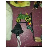 Small modern cast iron john deere bell
