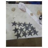 Group of 12 cast iron stars