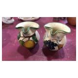 Pair of 3 inch creamers marked Italy, one is