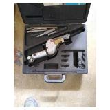 Dynabrade air-powered abrasive belt machine in